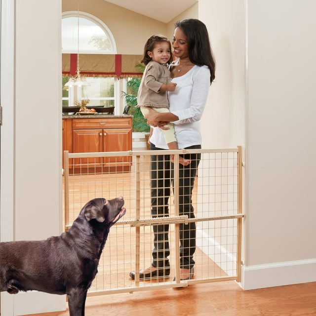 Evenflo Position & Lock Tall and Wide Value Adjustable Baby Gate, Pressure Mount, Locking Latch, For Use with Infants, Toddlers & Pets, 31" - 50", Natural Wood Baby Gate