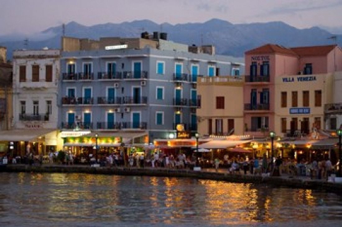 Evening Light along the Old Harbor Chania Crete Greece Canvas Art - Darrell Gulin DanitaDelimont (34 x 23)