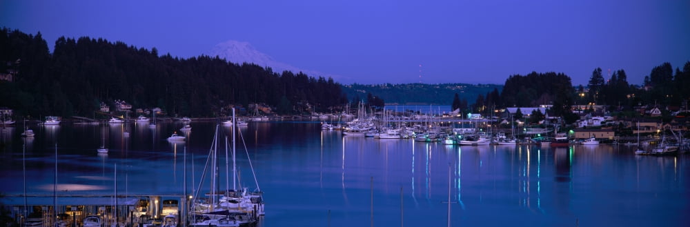 Evening light on boats moored in Gig Harbor with Mt Rainier in the background Puget Sound region of Washington State Canvas Art - Panoramic Images (27 x 9)