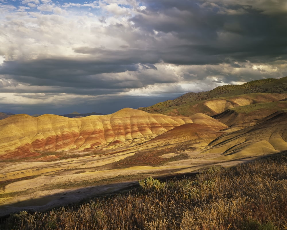 Evening light brightens the ridges of the Painted Hills Unit Mitchell Oregon United States of America Canvas Art - Robert L Potts Design Pics (17 x 13)