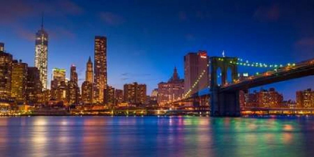 Evening shot of Lower Manhattan skyline and Brooklyn Bridge New York Canvas Art - Assaf Frank (10 x 20)