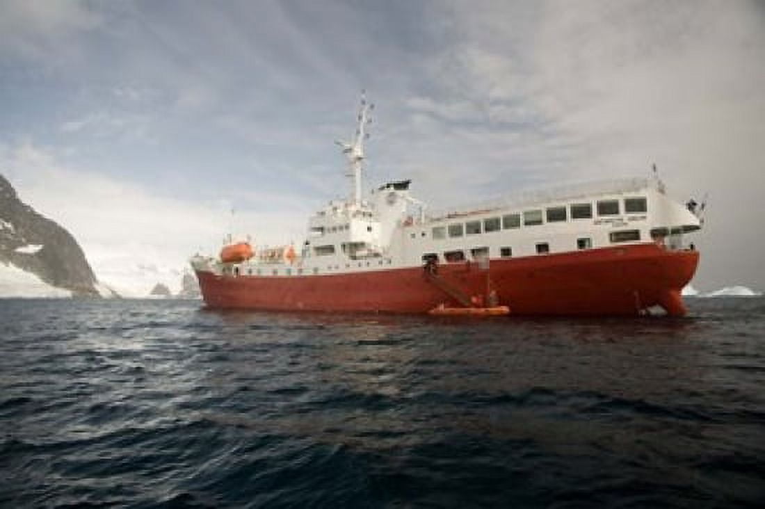 Expedition ship and zodiac Pleneau Island Antarctica Canvas Art - Dave Bartruff DanitaDelimont (34 x 23)