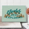 thumbnail image 1 of Explore Cutting Board, Hand Lettering Words on Traveling with Mountain and Forest Silhouette, Decorative Tempered Glass Cutting and Serving Board, in 3 Sizes, by Ambesonne, 1 of 2