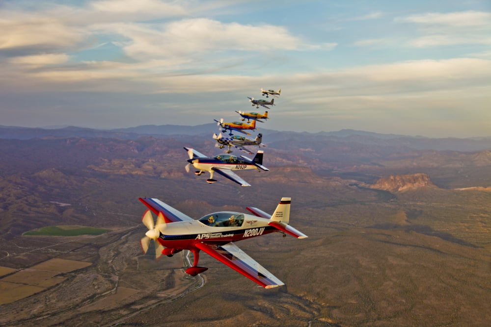Extra 300 aerobatic aircraft fly in formation over Mesa Arizona Canvas Art - Scott GermainStocktrek Images (18 x 12)
