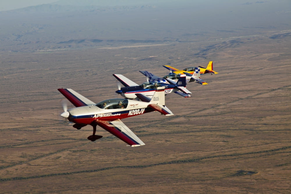 Extra 300 aerobatic aircraft fly in formation over Mesa Arizona Canvas Art - Scott GermainStocktrek Images (18 x 12)
