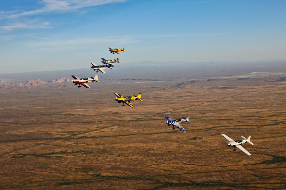 Extra 300 aerobatic aircraft fly in formation over Mesa Arizona Canvas Art - Scott GermainStocktrek Images (18 x 12)