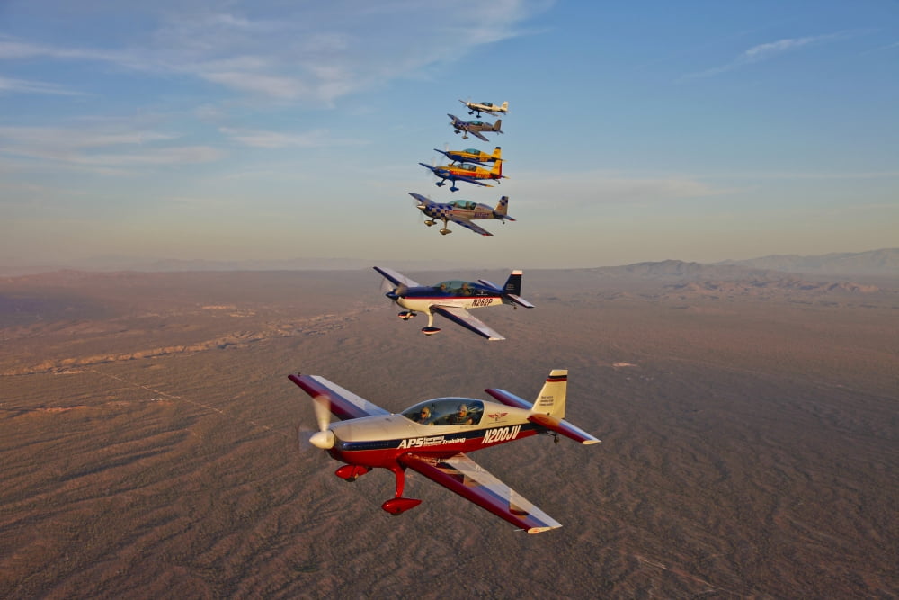 Extra 300 aerobatic aircraft fly in formation over Mesa Arizona Canvas Art - Scott GermainStocktrek Images (18 x 12)