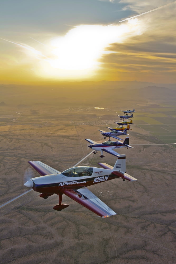 Extra 300 aerobatic aircraft fly in formation over Mesa Arizona Canvas Art - Scott GermainStocktrek Images (23 x 35)