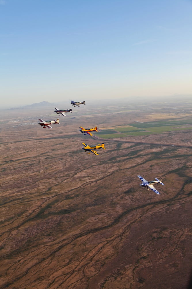 Extra 300 aerobatic aircraft fly in formation over Mesa Arizona Canvas Art - Scott GermainStocktrek Images (23 x 35)