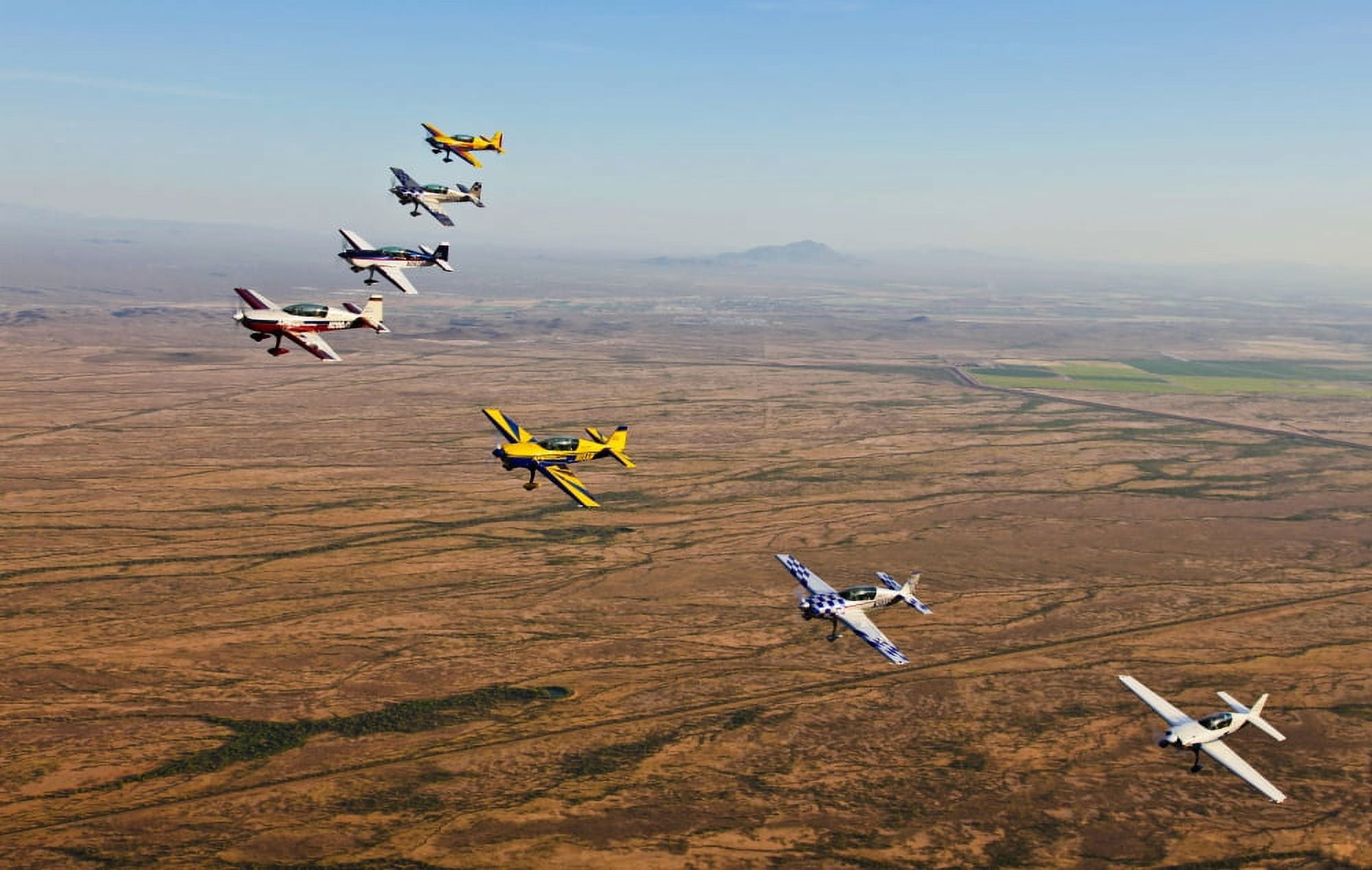 Extra 300 aerobatic aircraft fly in formation over Mesa Arizona Canvas Art - Scott GermainStocktrek Images (74 x 47)