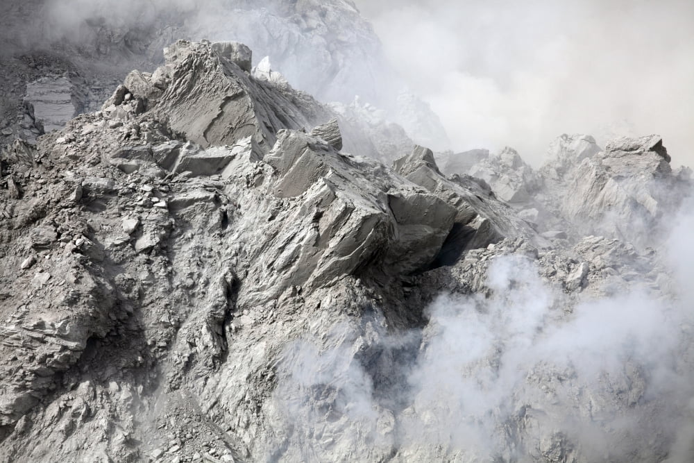 Extrusion lobe on Rerombola lava dome of Paluweh volcano Canvas Art - Richard RoscoeStocktrek Images (35 x 23)
