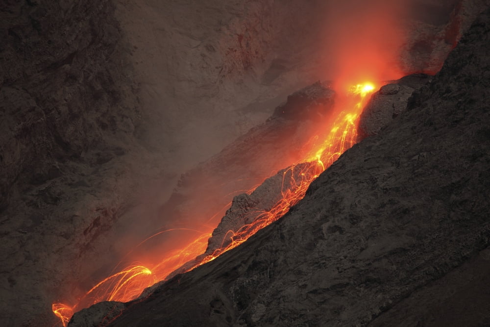 Extrusion of lava on glowing rockfalls Batu Tara volcano Indonesia Canvas Art - Richard RoscoeStocktrek Images (18 x 12)