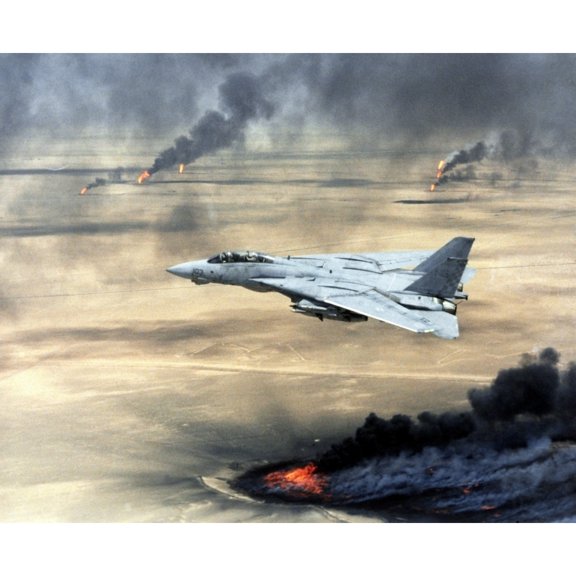 F-14 Fighter In Flight Over Burning Kuwaiti Oil Wells Set On Fire By Retreating Iraqi Forces During Operation Desert