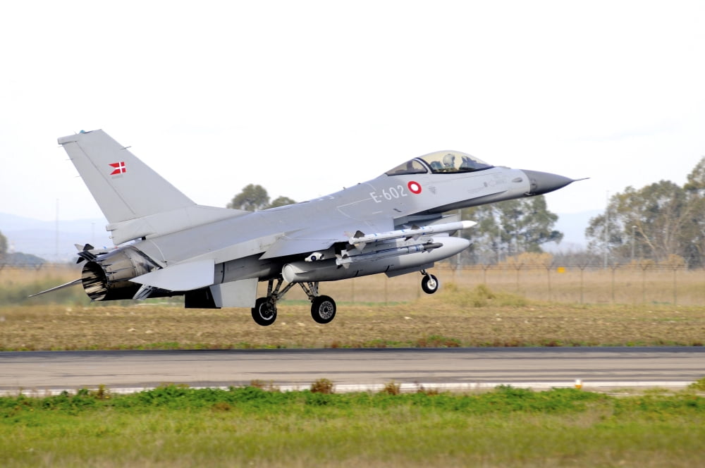 F-16A MLU Falcon from the Royal Danish Air Force landing at Grosseto Air Base Canvas Art - Riccardo NiccoliStocktrek Images (34 x 23)