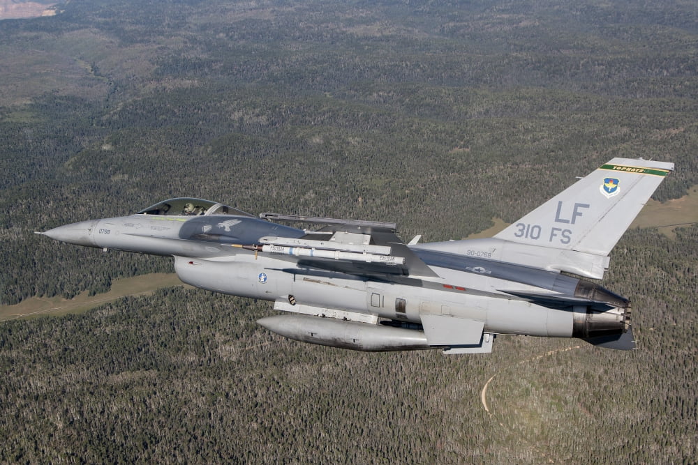 F-16C Fighting Falcon during a sortie over Arizona Canvas Art - Erik RoelofsStocktrek Images (35 x 23)
