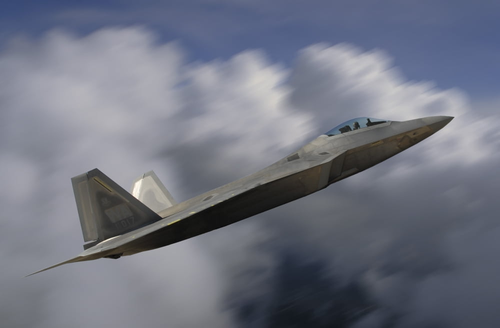 F-22 Raptor flying over California Canvas Art - Phil WallickStocktrek Images (17 x 12)