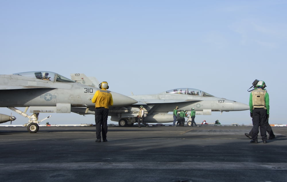 FA-18F Super Hornets on the flight deck of USS Theodore Roosevelt Canvas Art - Giovanni CollaStocktrek Images (35 x 23)
