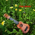 thumbnail image 1 of FAMTKT Kids Guitar Ukulele Beginner Musical Instrument 15 Inches with 4 Strings Mini Guitar for Skill Improving Kids Play Early Educational Pre School Children Toddler Kids Toys, 1 of 7