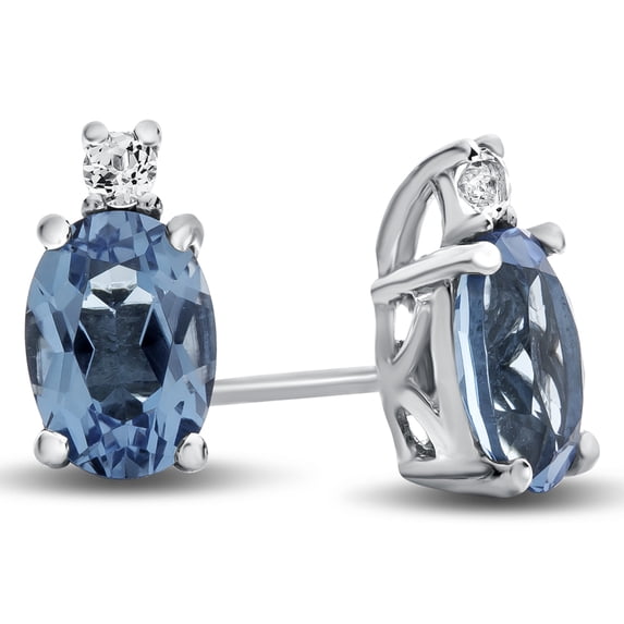 FJC Finejewelers 10k White Gold 7x5mm Oval Swiss Blue Topaz with White Topaz Earrings