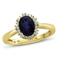 thumbnail image 1 of FJC Finejewelers 10k Yellow Gold 8x6mm Oval Created Blue Sapphire with White Topaz accent stones Halo Ring, 1 of 7