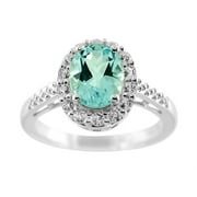 FJC Finejewelers 9x7mm Oval Blue Topaz and White Topaz Halo Ring