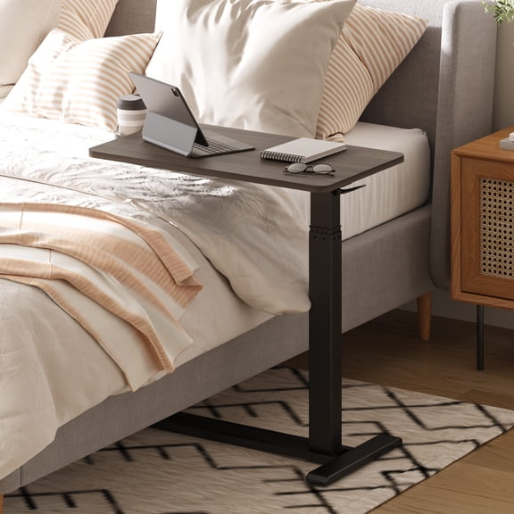 FitStand Height Adjustable Medical Bed Table with Hidden Casters, Rolling Laptop Desk with Cup Holder, Small Pneumatic Sit Stand Desk for Home Office, Sofa or Bedside Use, 28"x16", Walnut