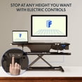 thumbnail image 1 of FitStand  35 " Electric Standing Desk Converter, Motorized Stand up Desk Riser, Monitor and Laptop Workstation with Wide Keyboard Tray, Black, 1 of 7