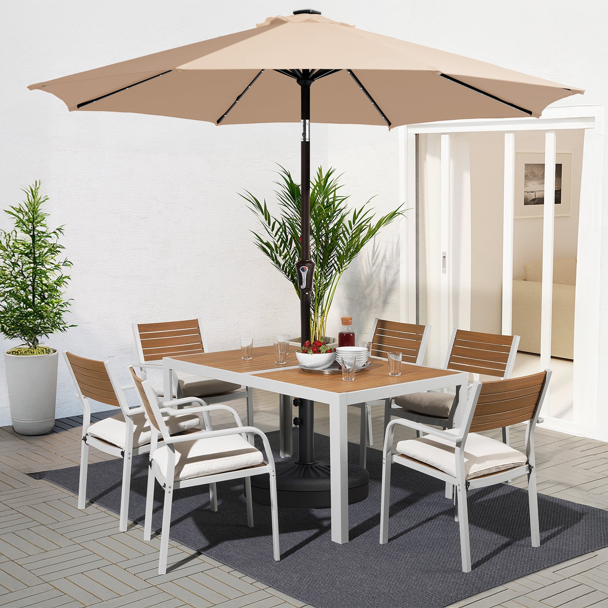 11 ft solar patio umbrella in beige Calypso Feet Octagon Market with LED Lights Create the perfect shaded retreat with our 11 ft Outdoor Umbrella with Base &