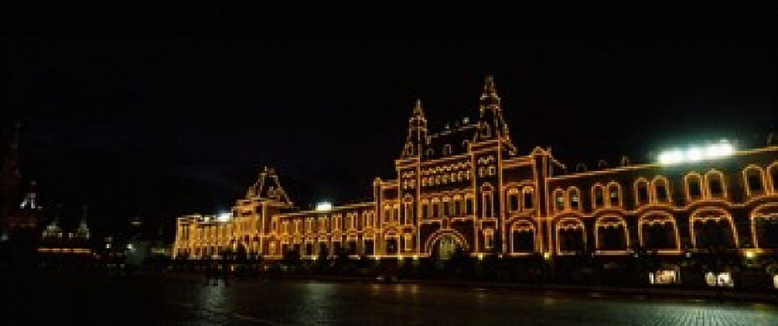 Facade of a building lit up at night GUM Red Square Moscow Russia Canvas Art - Panoramic Images (30 x 13)