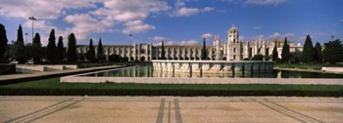 Facade of a monastery Mosteiro Dos Jeronimos Belem Lisbon Portugal Canvas Art - Panoramic Images (18 x 7)