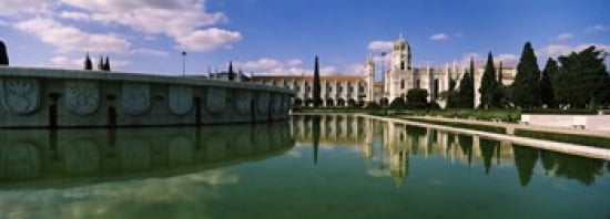 Facade of a monastery Mosteiro Dos Jeronimos Belem Lisbon Portugal Canvas Art - Panoramic Images (36 x 13)
