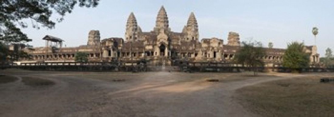 Facade of a temple Angkor Wat Angkor Cambodia Canvas Art - Panoramic Images (18 x 7)
