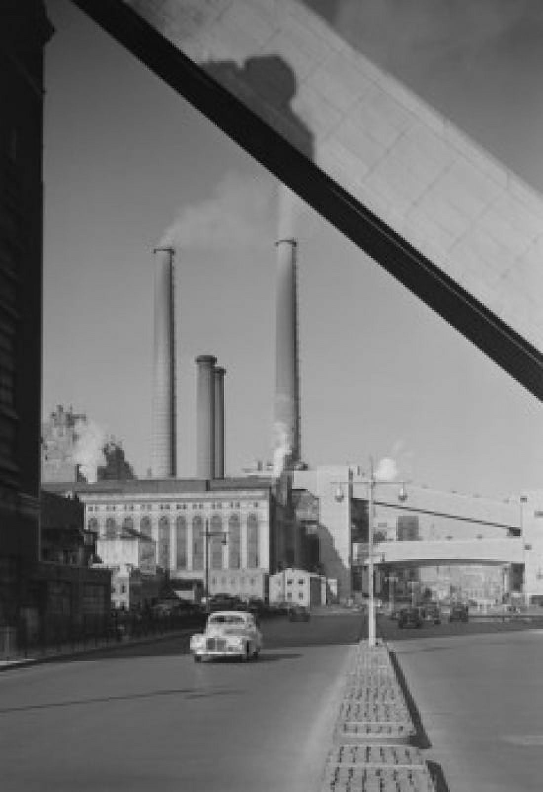 Factory with smoking chimneys road in the foreground Canvas Art - (24 x 36)
