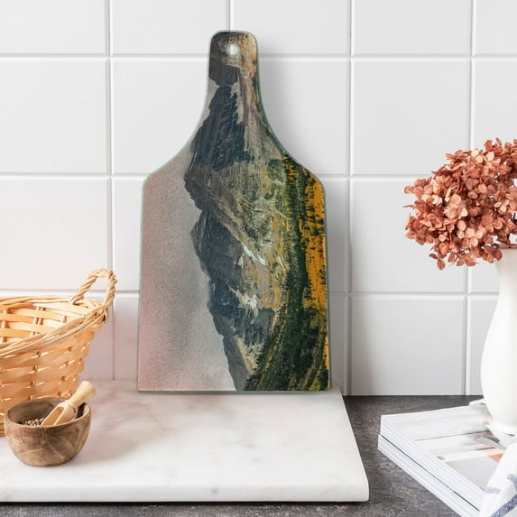 Fall Cutting Board, Idyllic Mountain Snowy Peaks and Clouds in the Sky on High Valley Print, Decorative Tempered Glass Cutting and Serving Board, Wine Bottle Shape, Multicolor, by Ambesonne