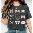 thumbnail image 1 of Fall Nurse Shirt with Coquette Bow, Retro Nursing School Graduation Gift Tee, Soft Girl Nurse T-Shirt, Trendy Autumn Healthcare Apparel, 1 of 5