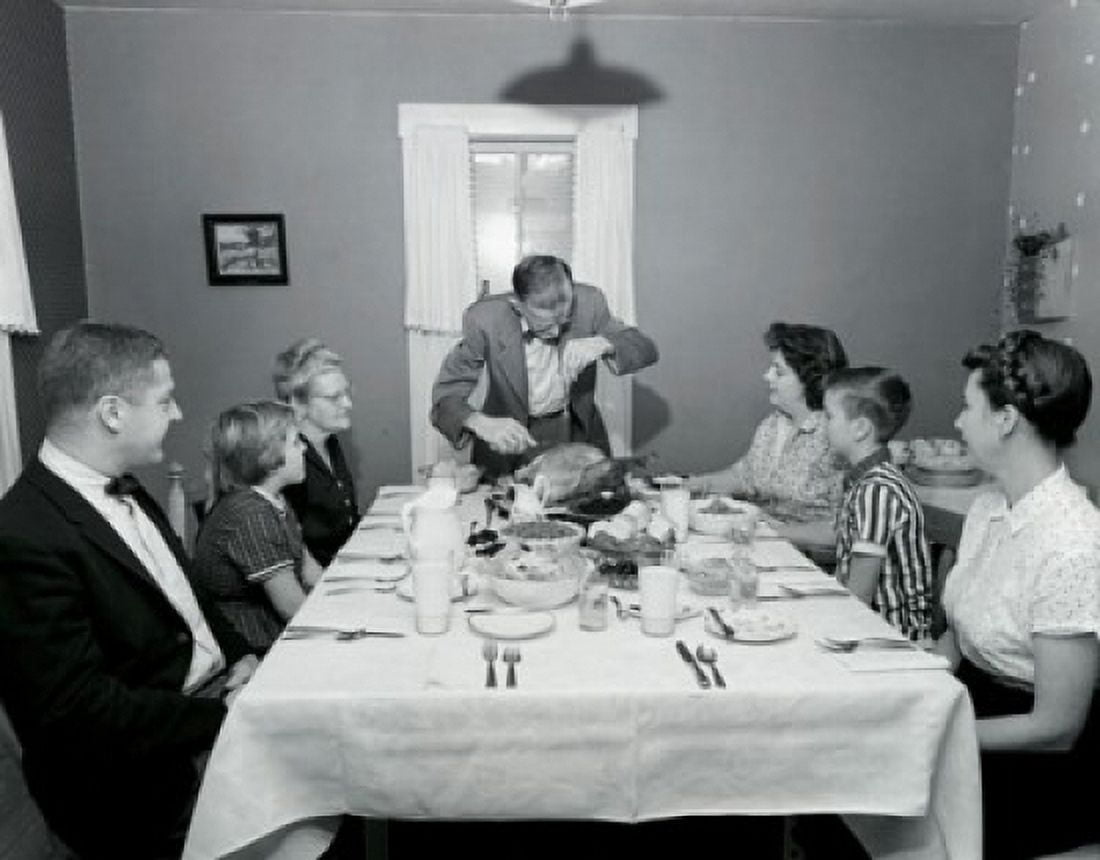 Family at a dining table on Thanksgiving Day Canvas Art - (24 x 36)