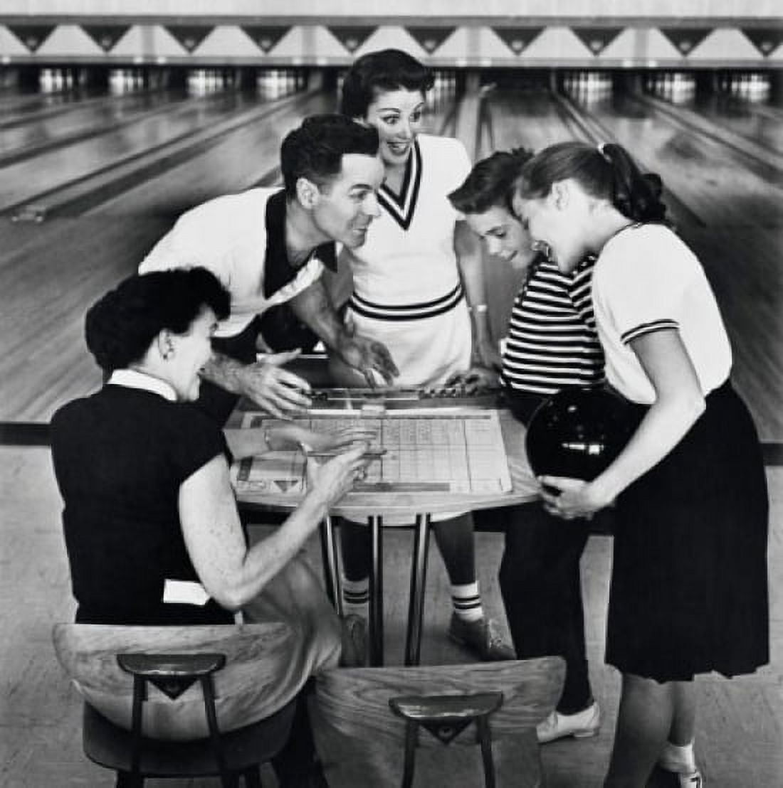 Family checking scores while bowling Canvas Art - (18 x 24)