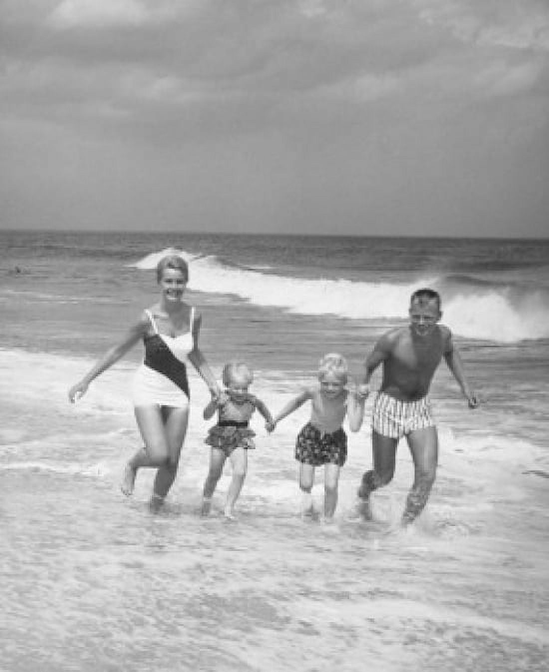 Family running on the beach Canvas Art - (18 x 24)