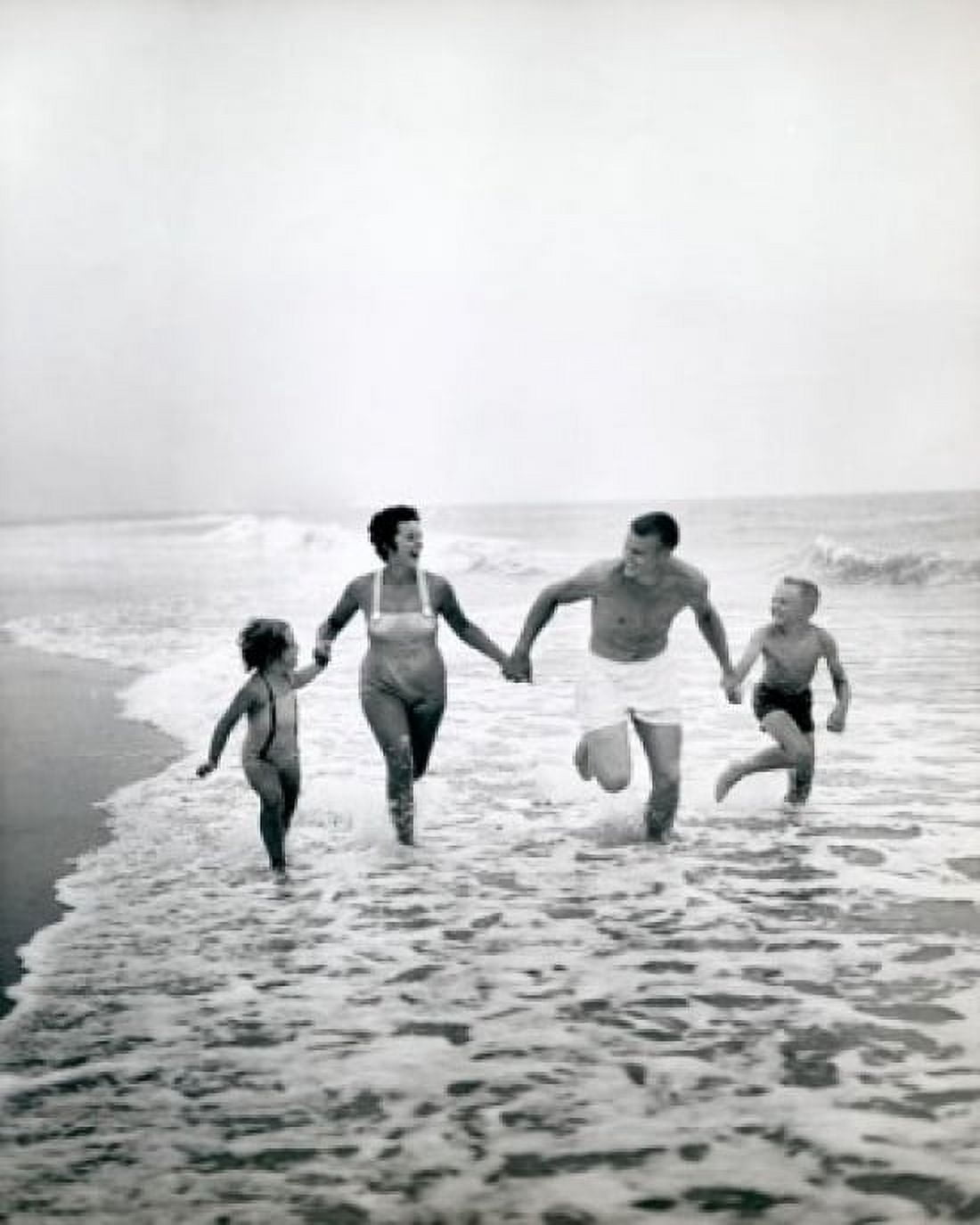 Family running on the beach Canvas Art -  (24 x 36)