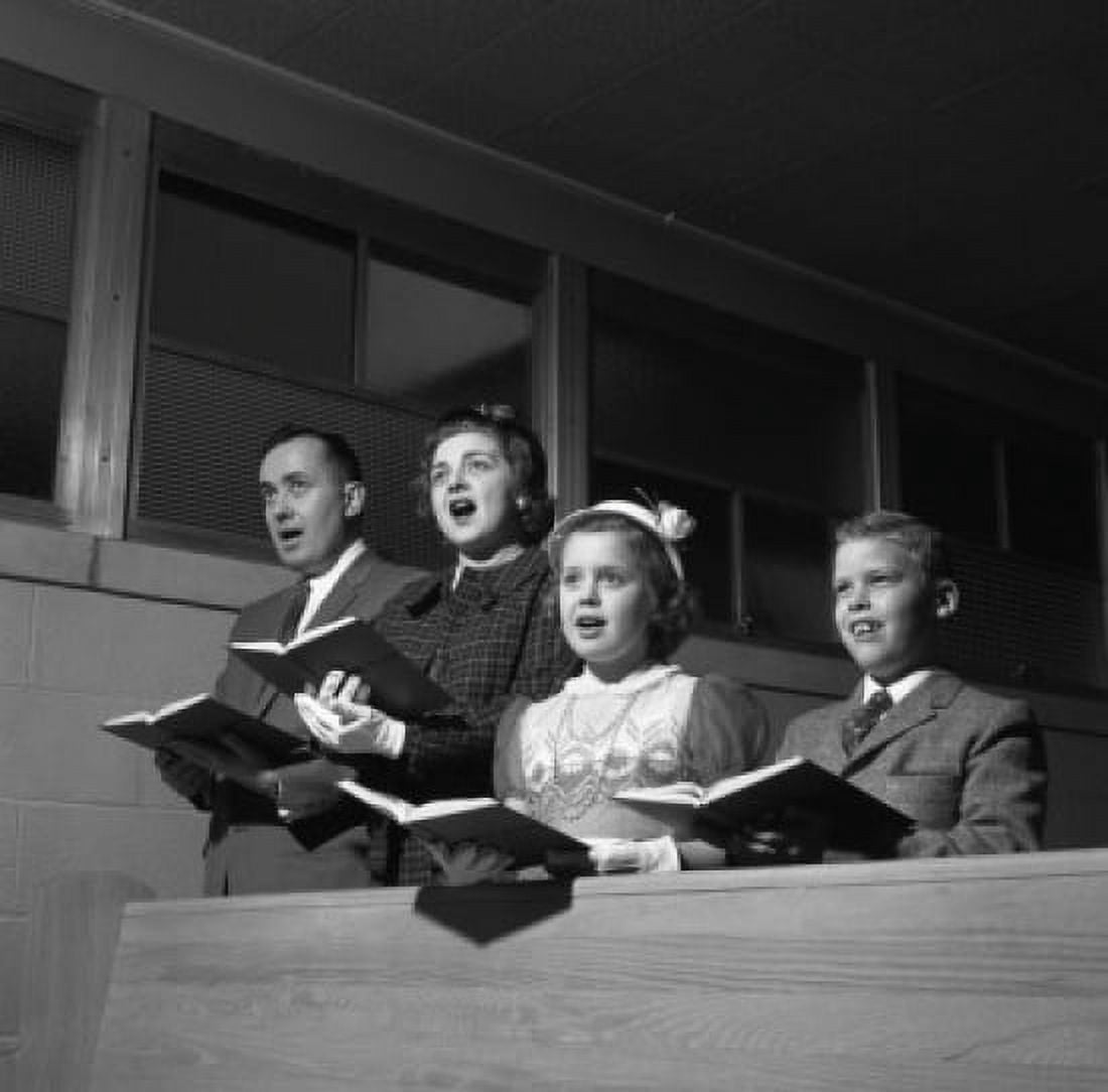 Family singing in church Canvas Art - (18 x 24)