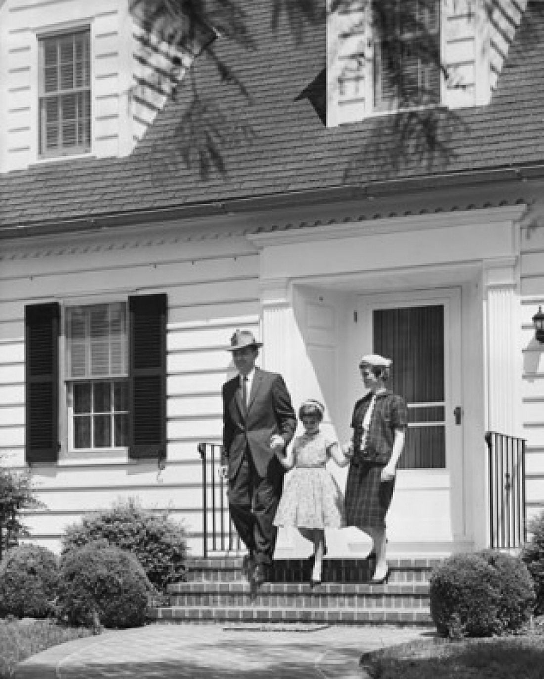 Family stepping out of their house Canvas Art -  (24 x 36)