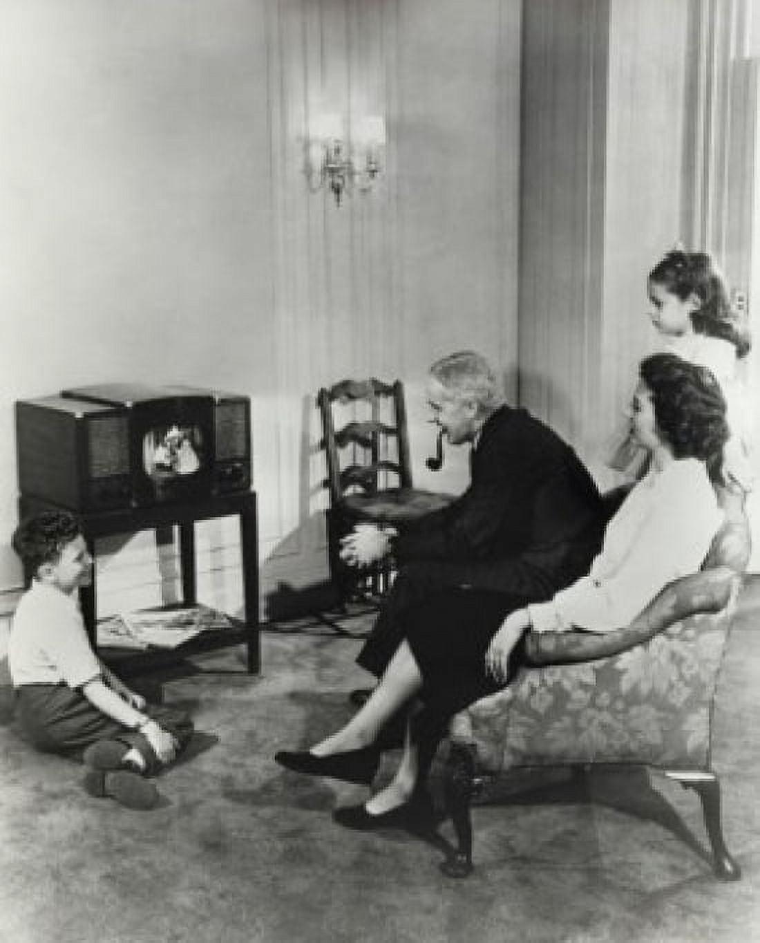 Family watching television at home Canvas Art - (18 x 24)