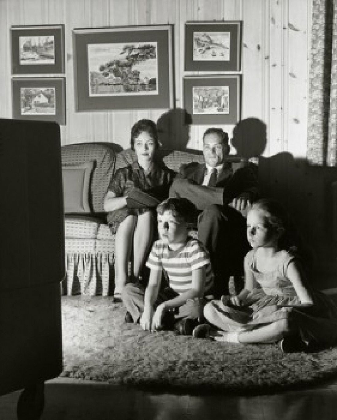 Family watching television in the living room Canvas Art - (18 x 24)