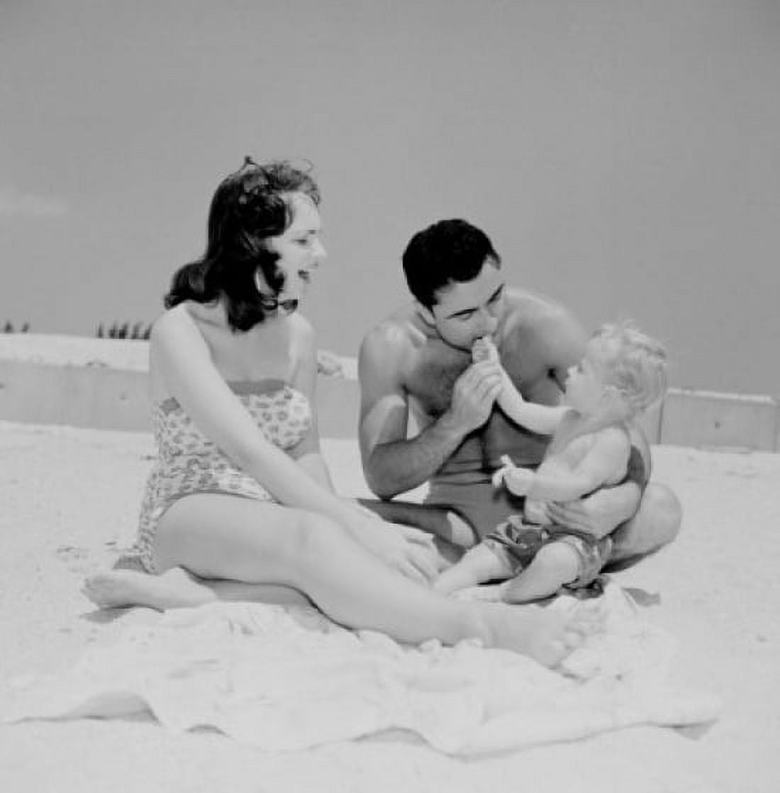 Family with baby boy on beach Canvas Art - (24 x 36)