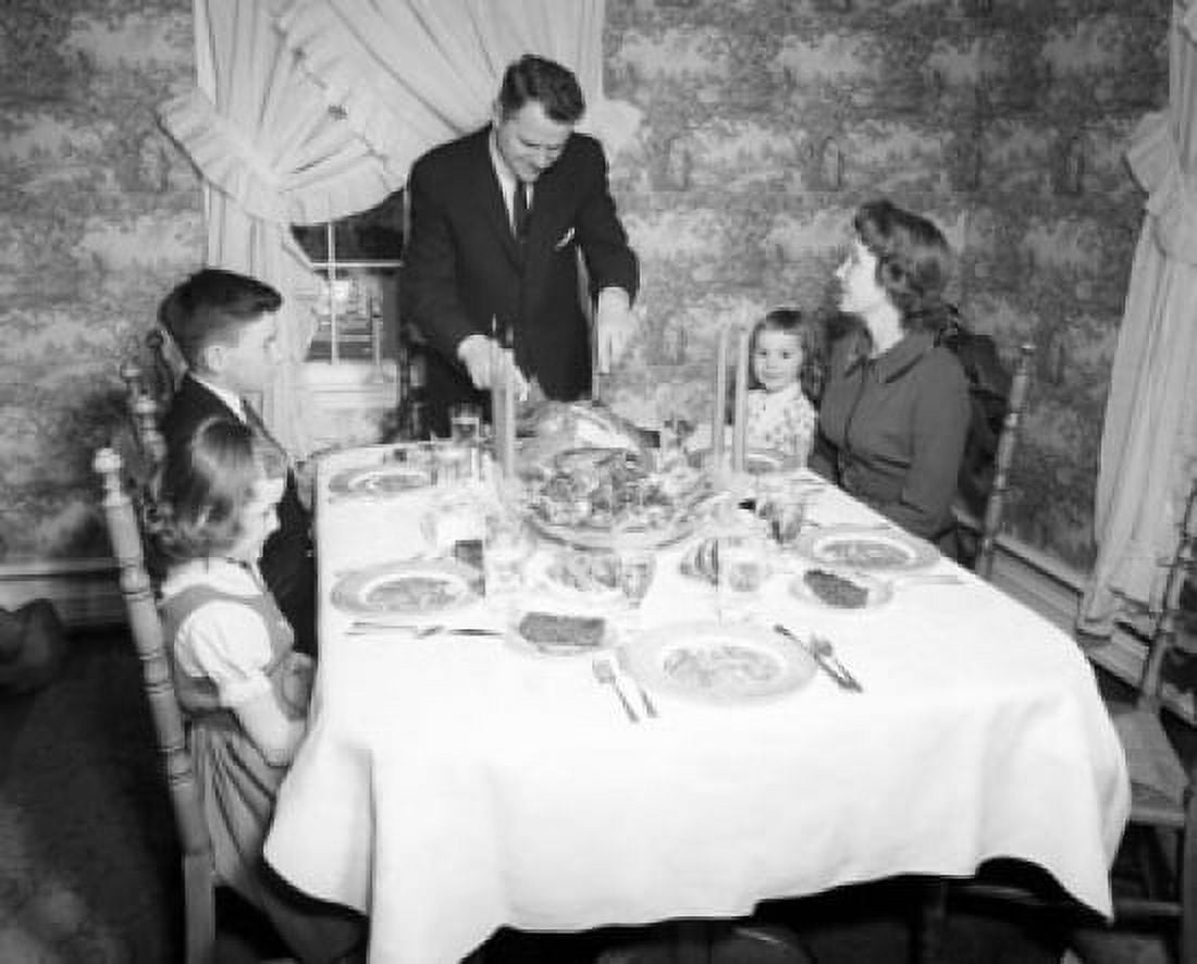 Family with children at dining table on Thanksgiving Day Canvas Art - (24 x 36)