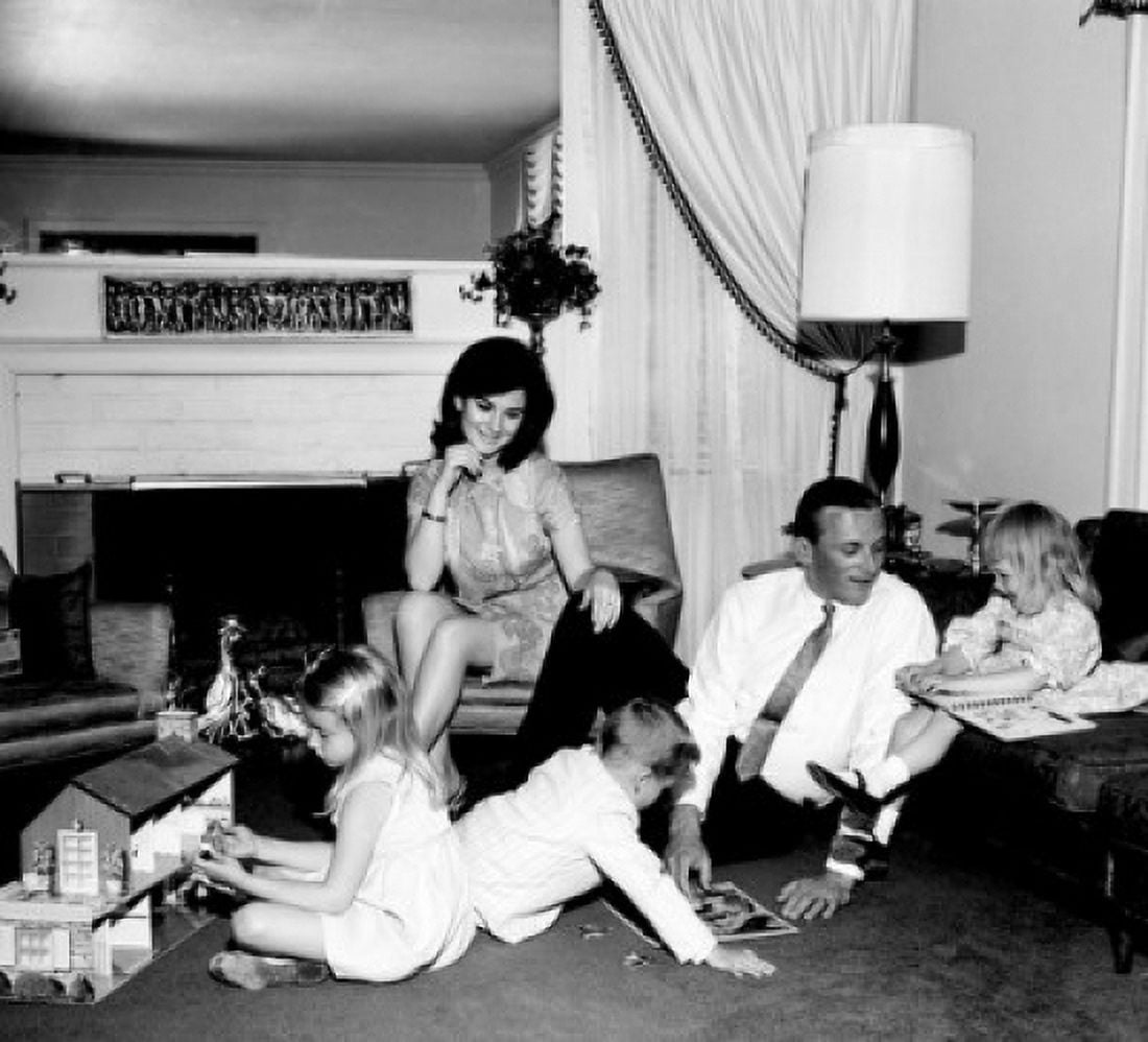Family with children playing in living room Canvas Art -  (24 x 36)