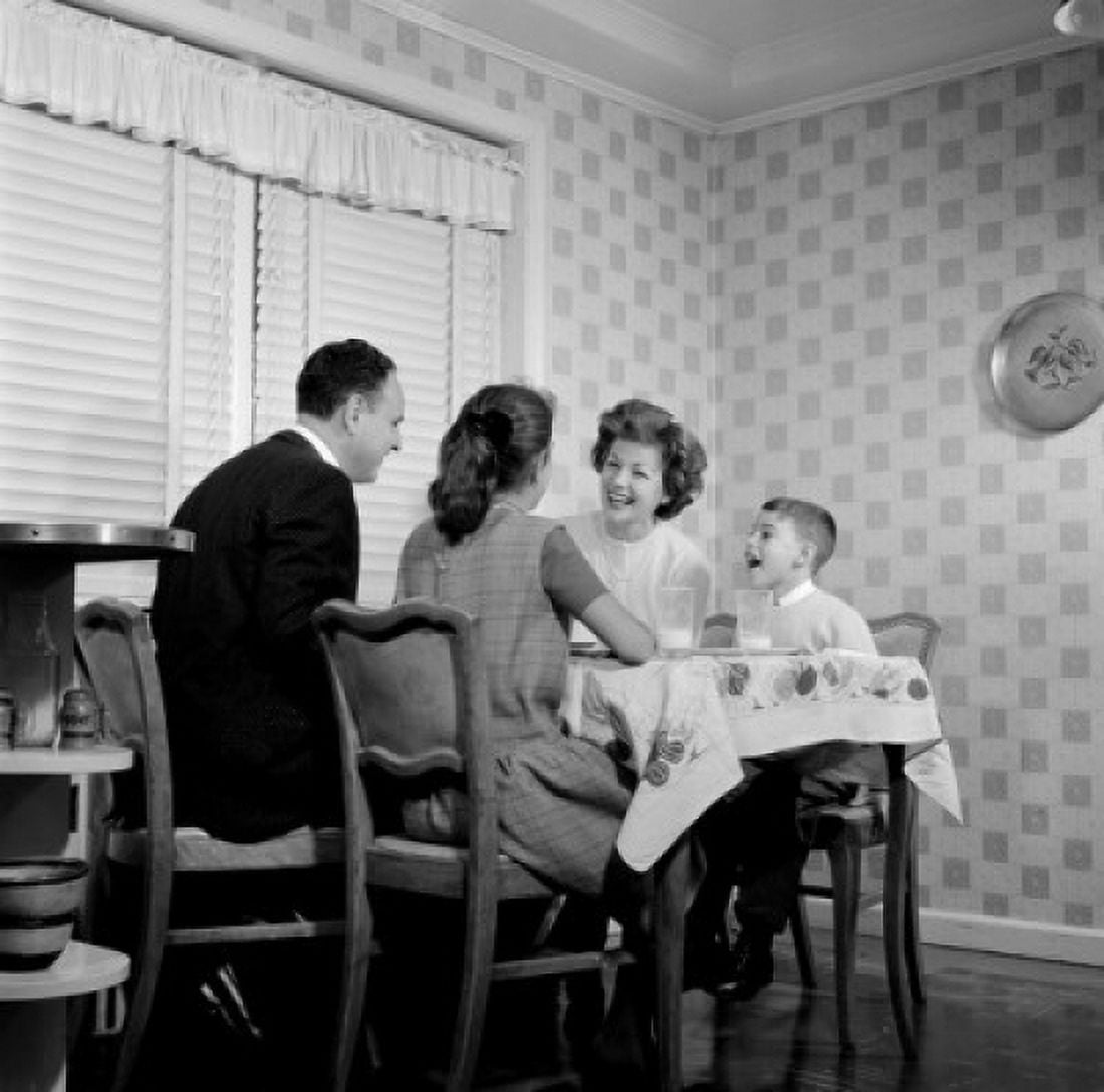 Family with children sitting at dining table Canvas Art - (24 x 36)