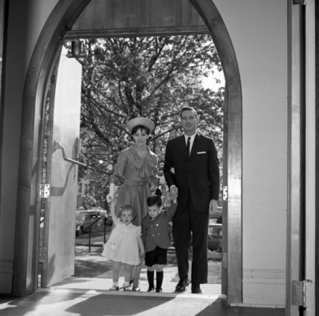 Family with daughter and son entering church Canvas Art - (18 x 24)