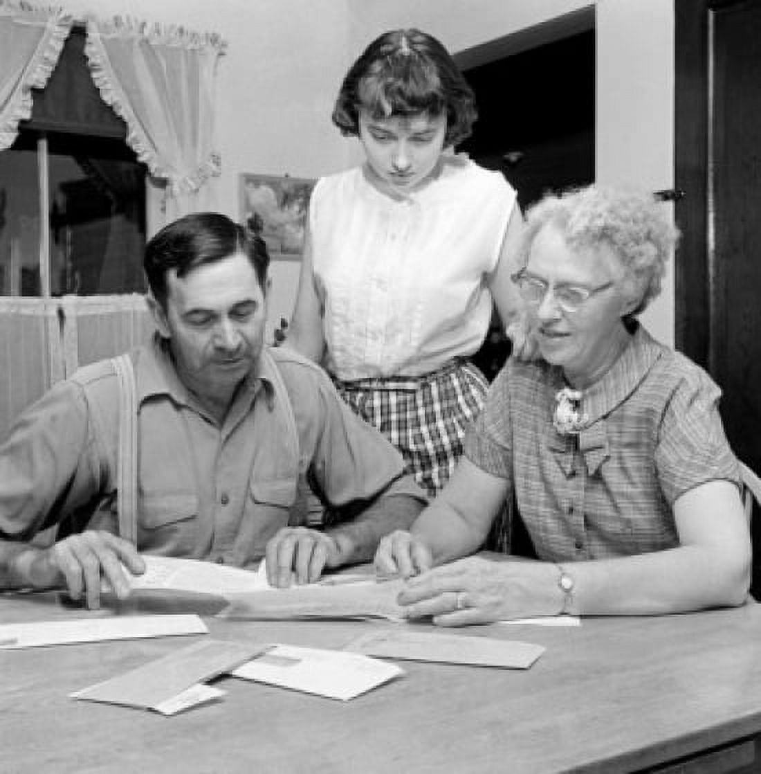 Family with teenage daughter planning home finance Canvas Art - (18 x 24)
