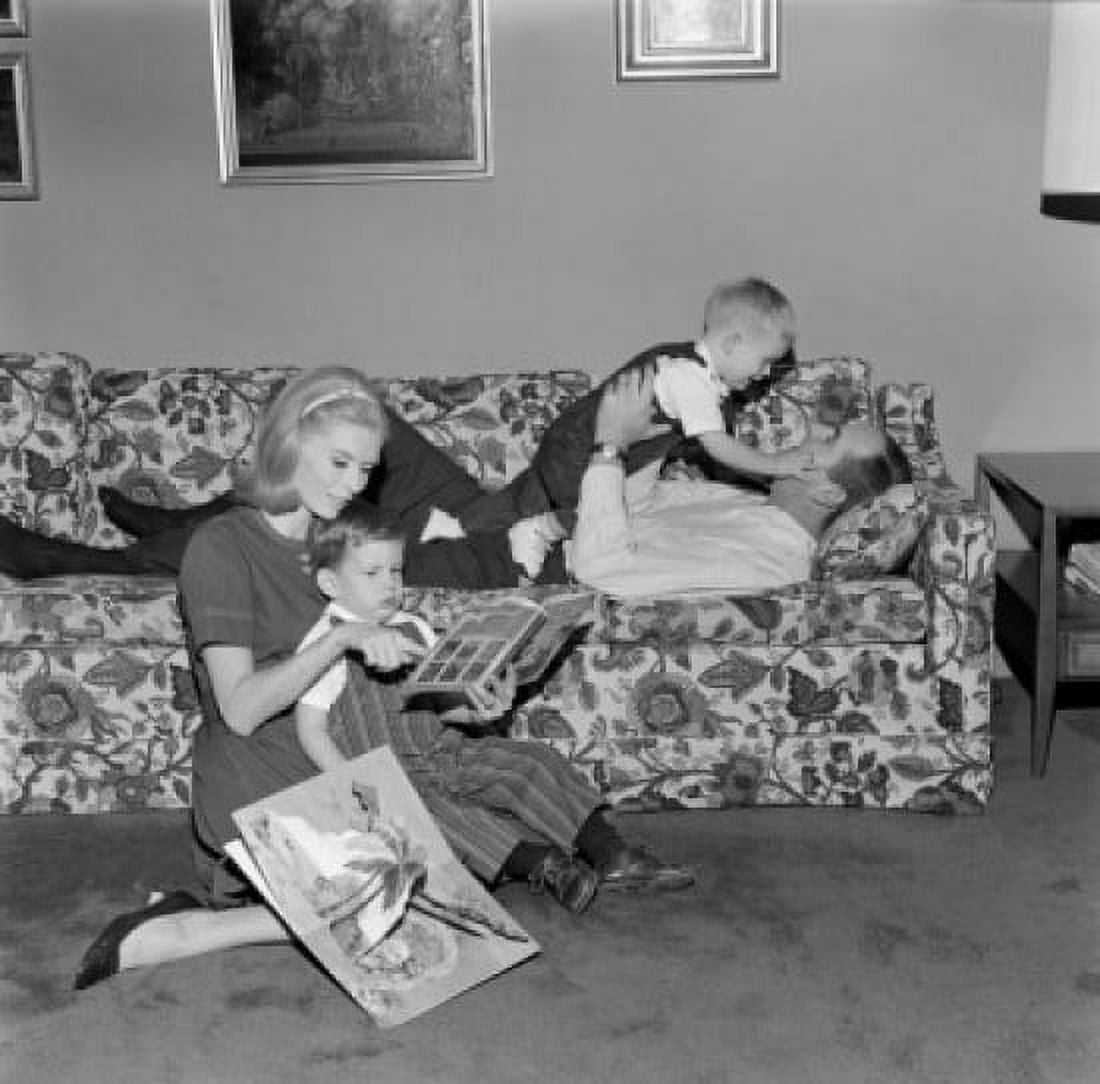 Family with two children in living room Canvas Art -  (24 x 36)